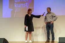 Moderatorin Dana Hoffmann und Achim Eckle von Wieland